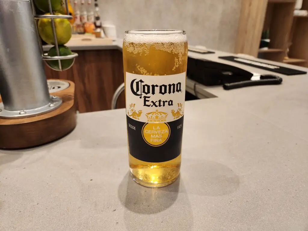 A pint of Corona Extra In A Can-shaped glass