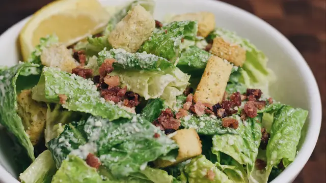 A close up of a Chicken Caesar Salad in a bowl