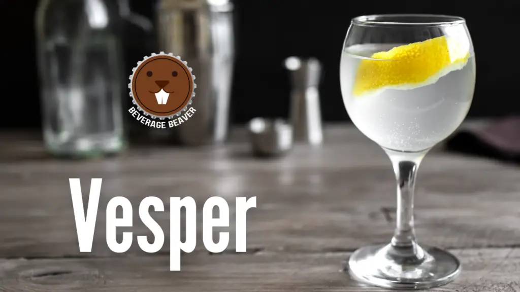 A Vesper Cocktail on a grey table.