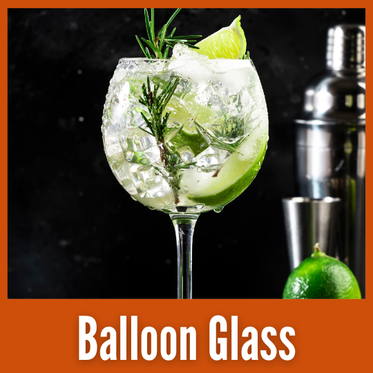 A cocktail in a Balloon Glass