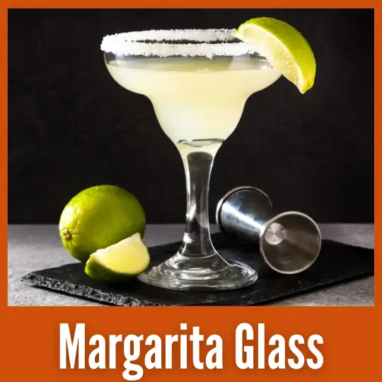 A cocktail in a Margarita Glass
