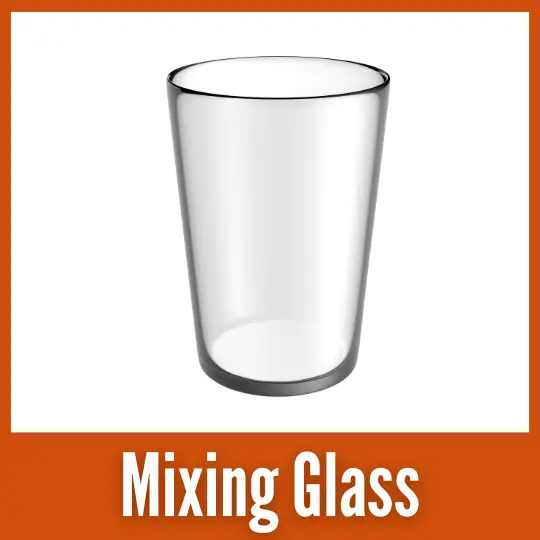 A cocktail mixing glass